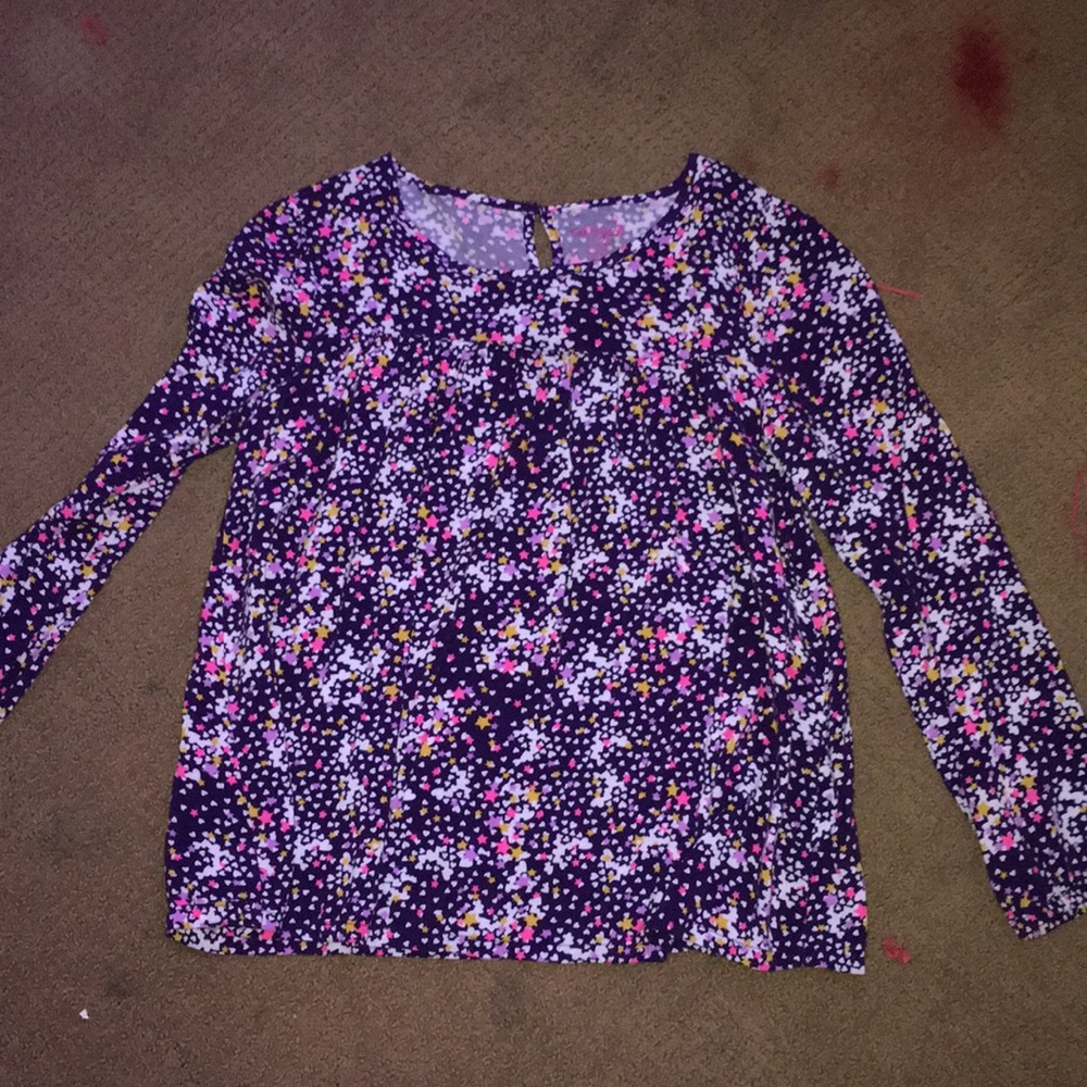 Long sleeve kids blouse. Button in back.